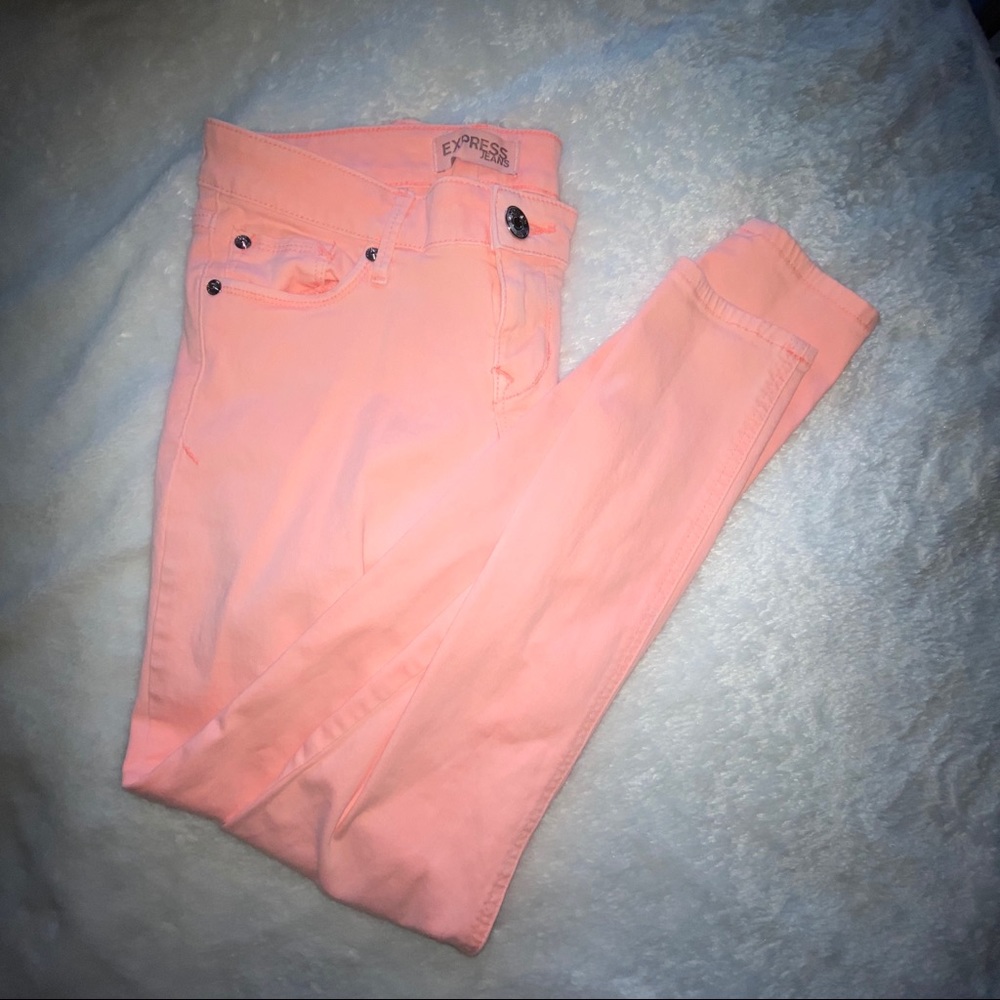 Express peach skinny jeans
